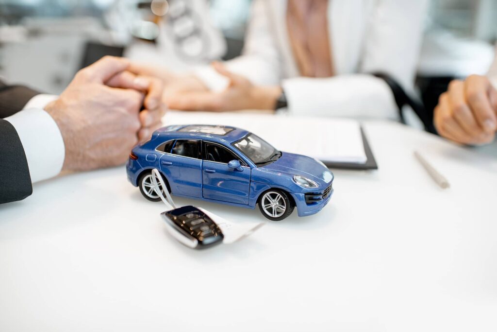 toy car with keychain on the table ULMHWNR